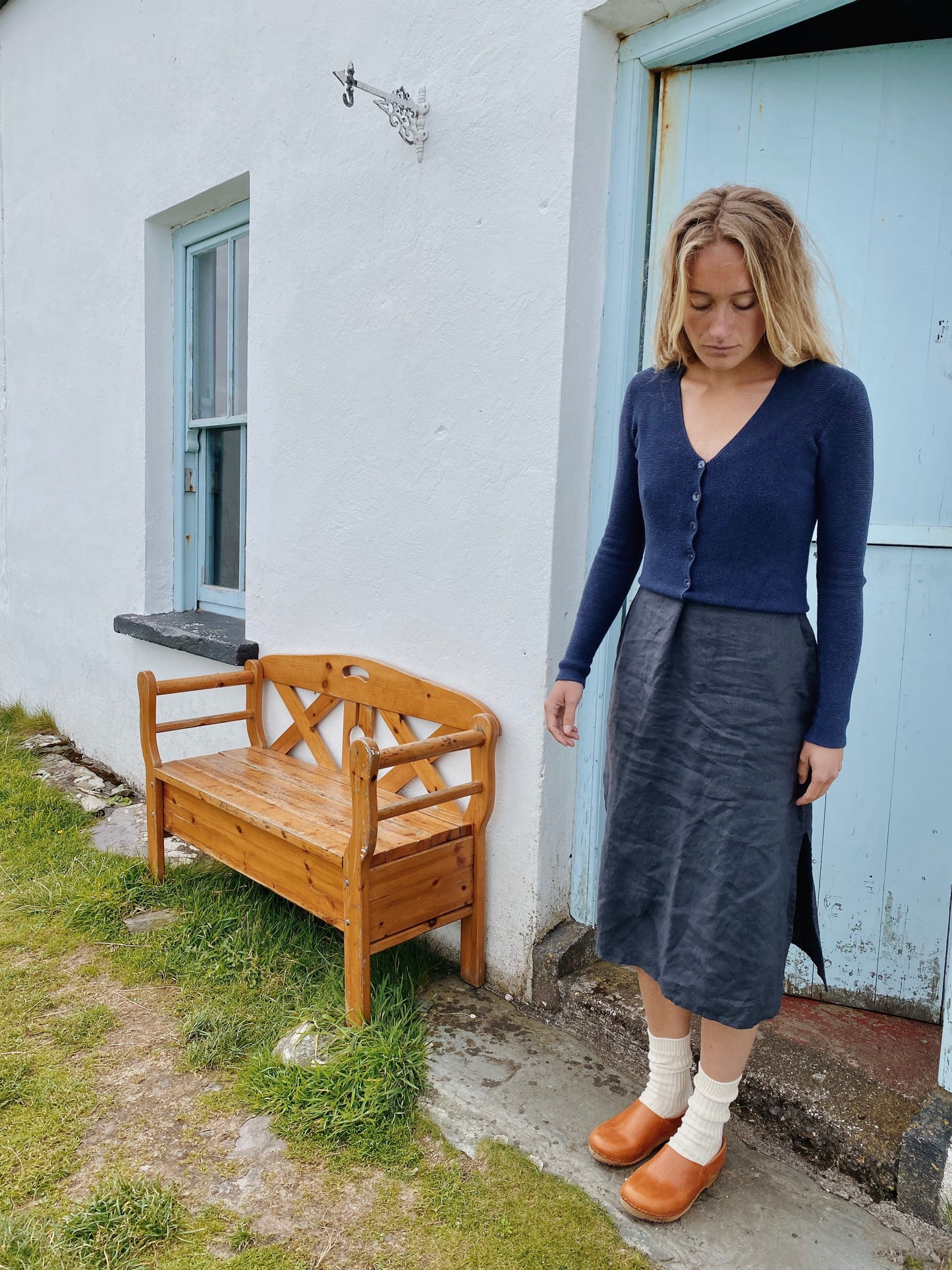 Cumin tan swedish clogs with a low wooden base and covered back